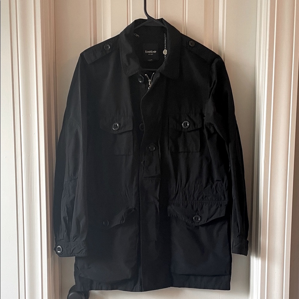 Bebe women’s multi-pocket anorak trench utility jacket.